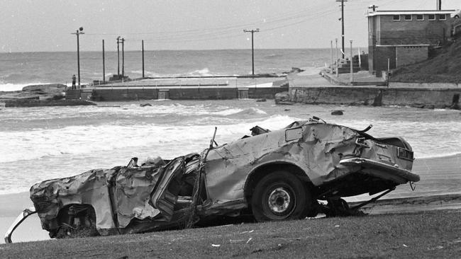 This stolen car was washed into the Dee Why rock pool and then washed out of it and dumped on Dee Why Beach