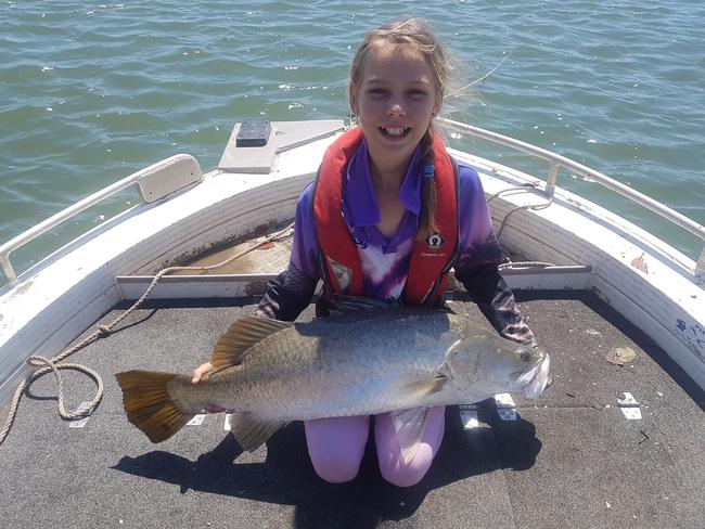 Katie Bennett showing her impressive barra catch.