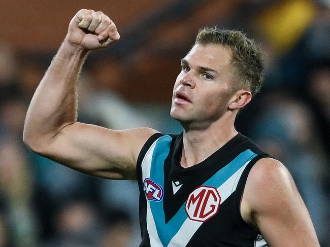 ADELAIDE, AUSTRALIA - AUGUST 03: Dan Houston of the Power  celebrates a goal  during the round 21 AFL match between Port Adelaide Power and Sydney Swans at Adelaide Oval, on August 03, 2024, in Adelaide, Australia. (Photo by Mark Brake/Getty Images)