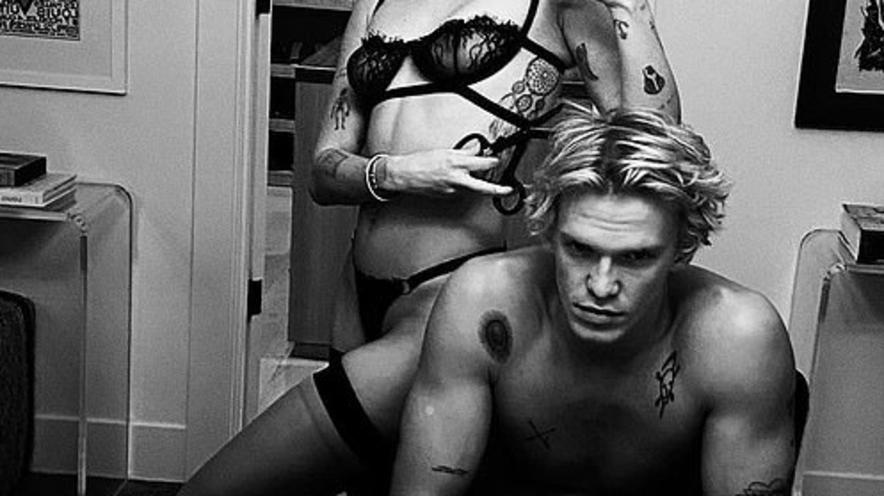 Miley Cyrus gives Cody Simpson haircut in lingerie | The Courier Mail