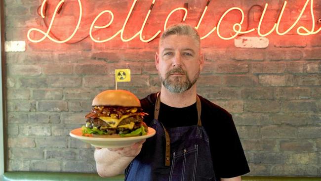 Officially the most popular burger in Burger Urge's history, the Double Decker Death Wish. Head Chef Joel Chrystal.