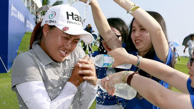 Staff pour water on Minjee Lee after she win the Blue Bay LPGA.