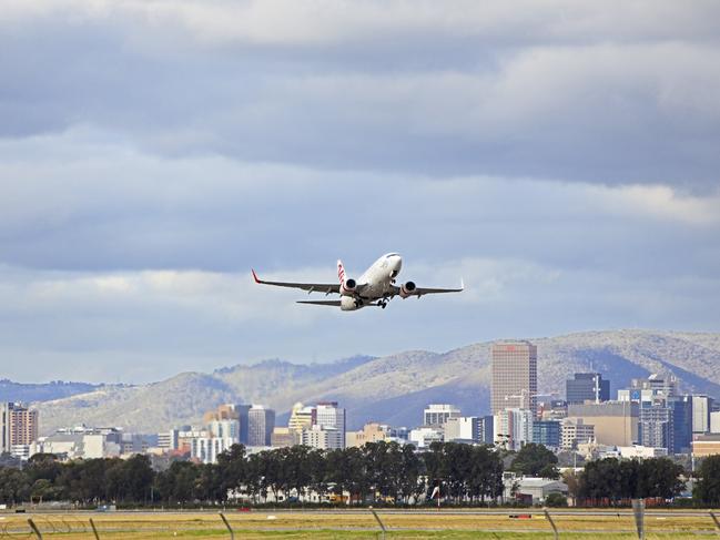 Adelaide, Australia - April 26, 2015: On a cloudy day in Adelaide, a Virgin 737-7FE aeroplane lifts off the runway and becomes airborne. Picture: iStock