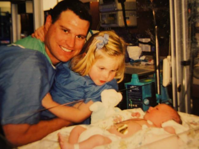 Lance Tumulty with Sara and newborn Caroline at the hospital in 2001. Picture: Supplied