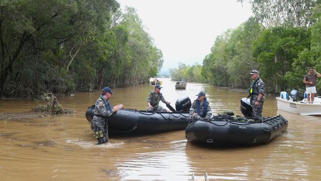 Navy teams arrive at Holloways Beach in response to devastating flooding of the Barron delta. Picture: Peter Carruthers