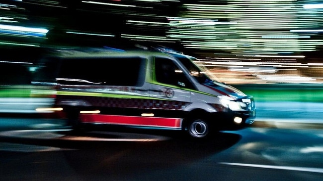 A man has been rushed to hospital after a vehicle rolled at Helidon on Monday night.