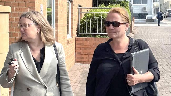 06-11-2024 Hillcrest jumping castle operator Rosemary Gamble (R)  walking into Devonport magistrates Court.  Picture - Matthew Denholm