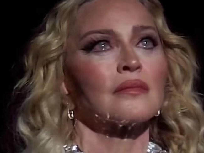 Madonna broke down in tears on stage as she remembered a friend who died while she held their hand. Picture from X.