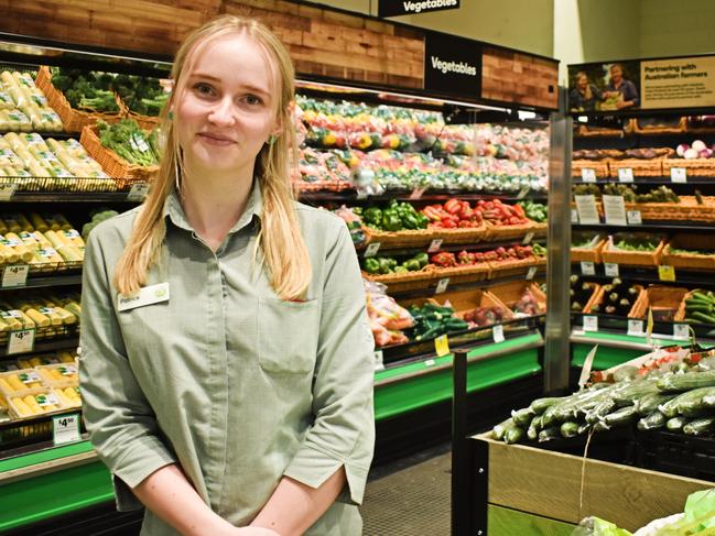 Supermarket staff including Woolworths Stanthorpe employee Patrice Hughes have maintained a smile through the difficult times in recent months.