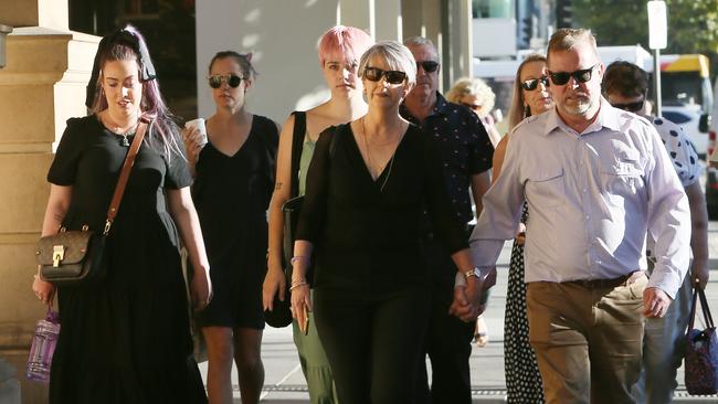 Chelsea Ireland’s sister Maddie, mother Debra and father Greg enter court with supporters ahead of Pawel Klosowski’s sentencing. Picture: NCA NewsWire / Emma Brasier