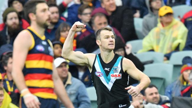 Robbie Gray celebrates a goal against the Crows in the Showdown. Picture: AAP Image/David Mariuz