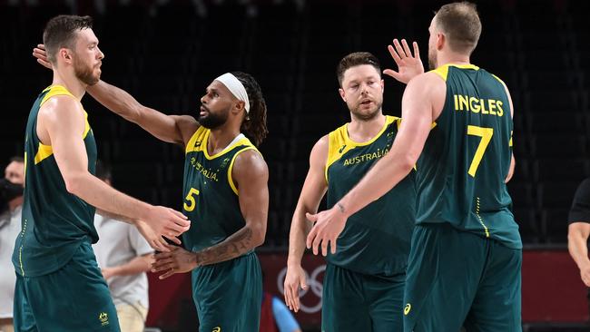 High fives for a victory well-fought. Picture: AFP