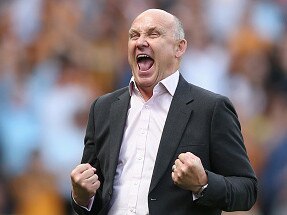 HULL, ENGLAND - AUGUST 13: Mike Phelan, caretaker Manager of Hull City celebrates on the sideline during the Premier League match between Hull City and Leicester City at KCOM Stadium on August 13, 2016 in Hull, England. (Photo by Alex Morton/Getty Images)