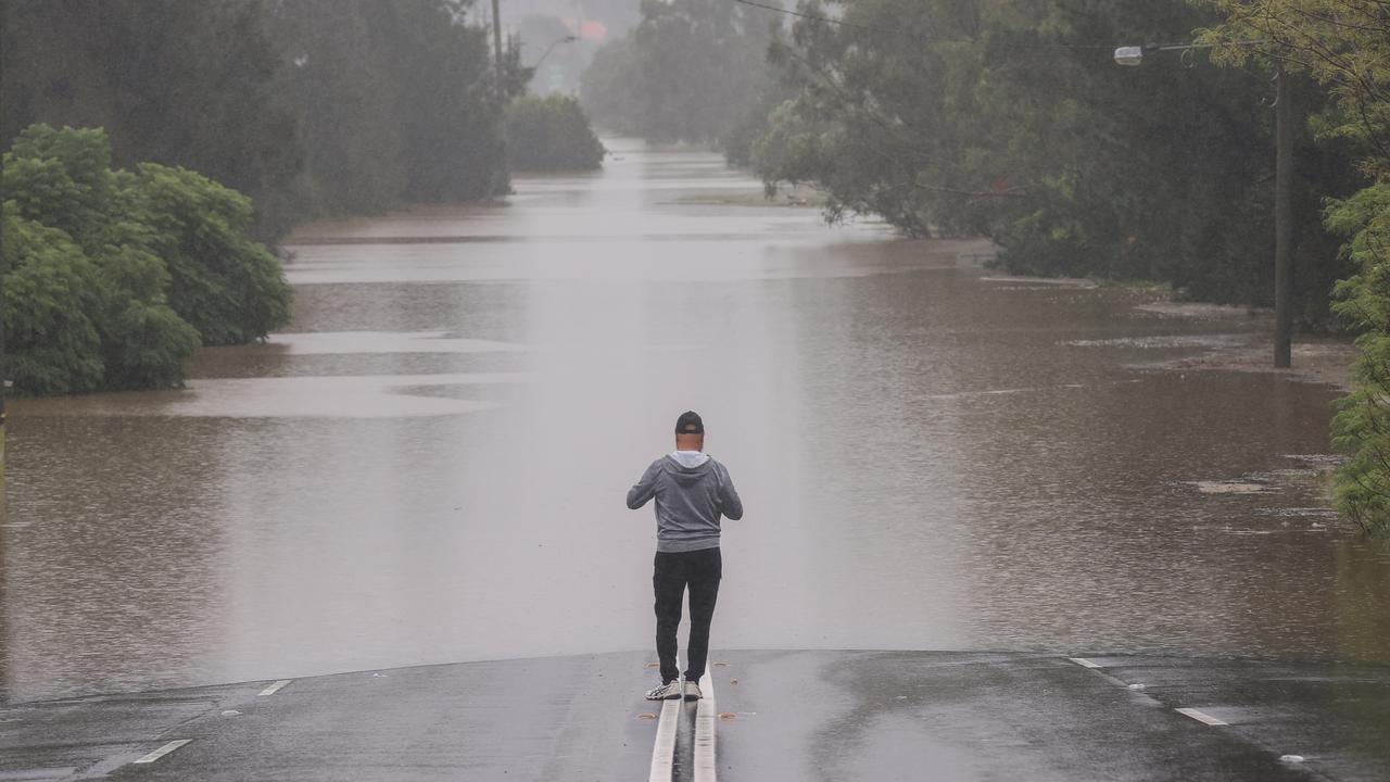 A man stands on Windsor Road in McGraths Hill. Picture: Getty Images