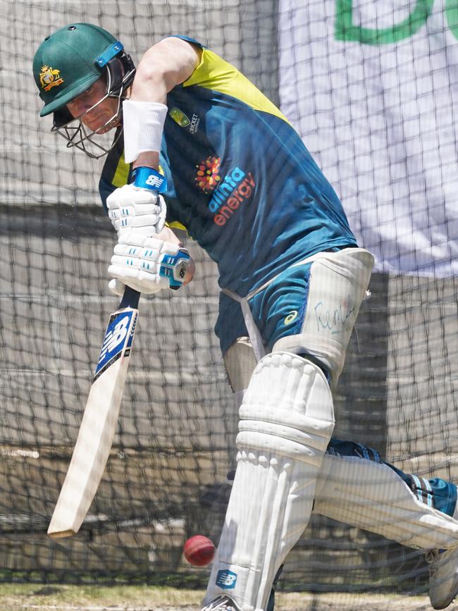 Steve Smith goes on the attack during a nets session at the MCG on Monday.