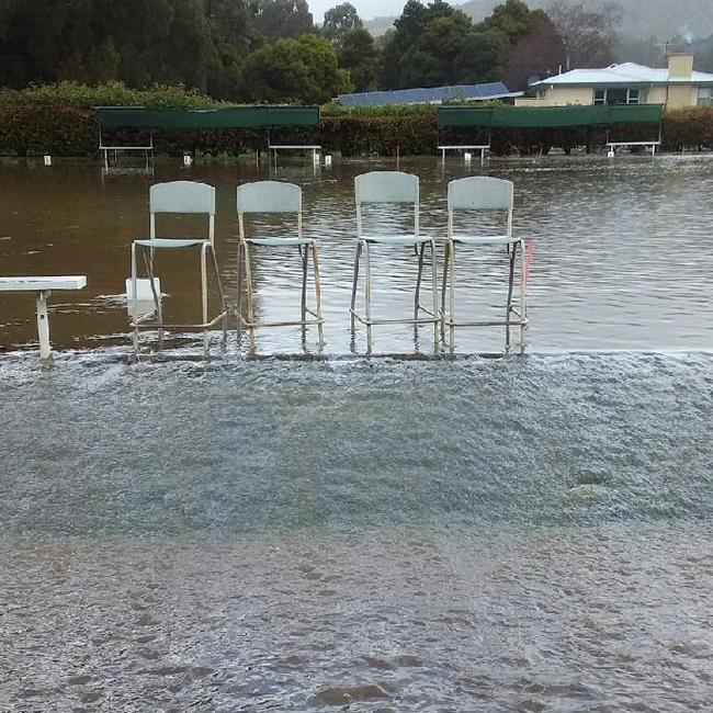 Huon Valley locals assess the damages in the aftermath of Sunday's floods. Picture: Supplied