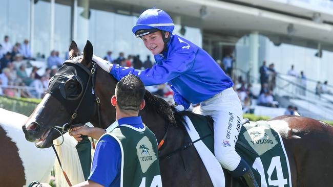 Jamie Kah returns to the mounting yard on Cylinder after winning the Yulong Newmarket Handicap at Flemington Racecourse on March 09, 2024 in Flemington, Australia. (Photo by Brett Holburt/Racing Photos via Getty Images)