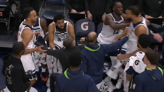 Rudy Gobert was shoved away by teammates. Photo: Twitter, ESPN.