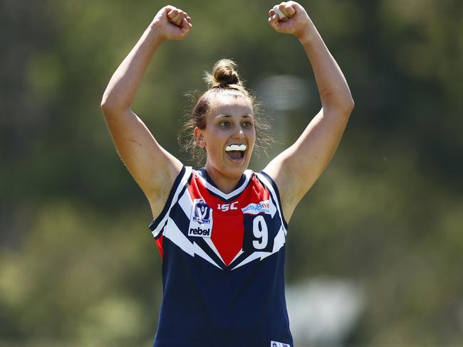 MELBOURNE, AUSTRALIA - FEBRUARY 12: Alyssa Mifsud of Darebin celebrates after winning the round one VFLW match between Darebin and Williamstown at LaTrobe University on February 12, 2022 in Melbourne, Australia. (Photo by Daniel Pockett/AFL Photos/via Getty Images)