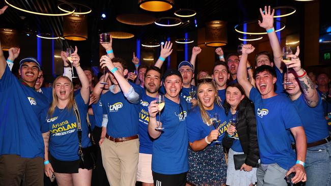 Voters and supporters celebrate as they wait for the new premier to appear at the LNP function in Brisbane. Picture: NewsWire/Tertius Pickard