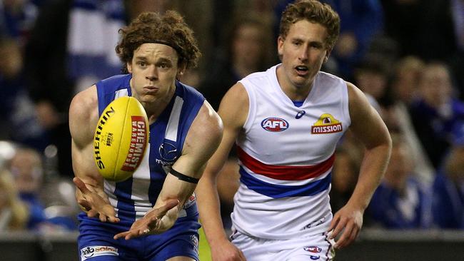 Ben Brown marks in front of Aaron Naughton. Picture: AAP