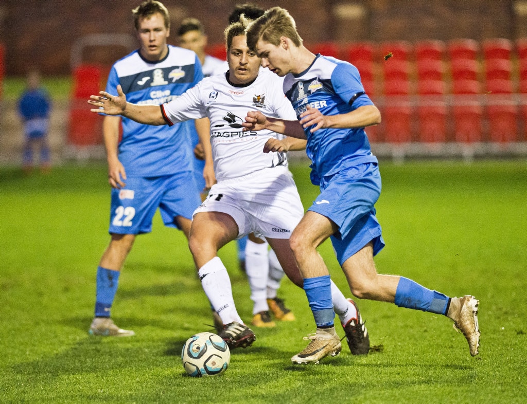 Ezra Kennell, Magpies and Daniel Weber, Thunder. Picture: Nev Madsen