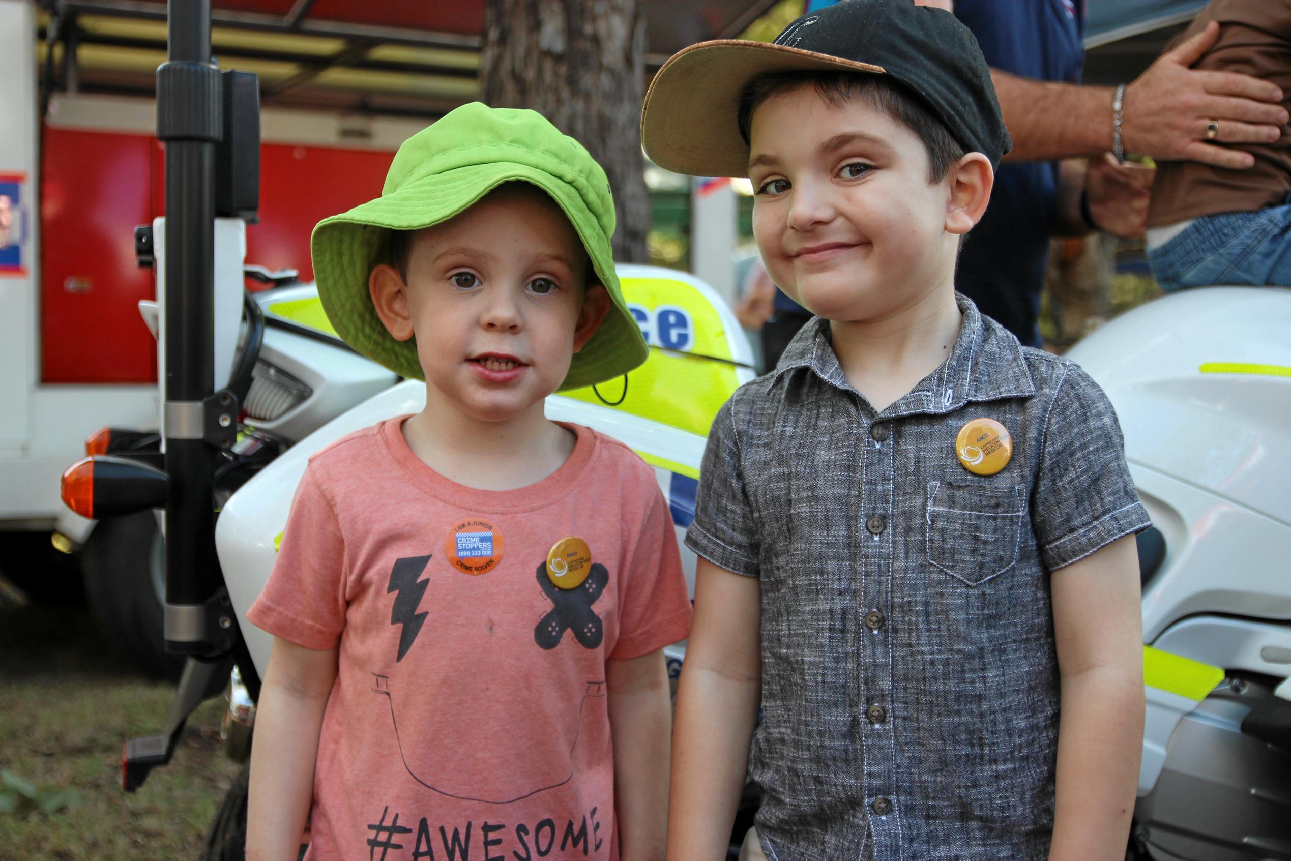 Zaviar Lawrence and Heath Howard were excited to check out all the Queensland Police Service vehicles at the Emergency Services Day on Sunday. Picture: Shayla Bulloch