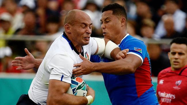 Italian captain Sergio Parisse (L) at his fifth Rugby World Cup.