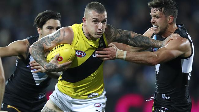 AFL - Port Adelaide v Richmond - Round 15 - Adelaide Oval. Dustin Martin tries to get past Travis Boak. Picture Sarah Reed