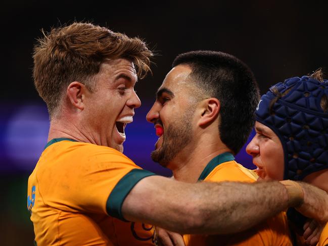 SYDNEY, AUSTRALIA - JULY 06: Tom Wright of the Wallabies celebrates with Andrew Kellaway after scoring a try during the men's International Test match between Australia Wallabies and Wales at Allianz Stadium on July 06, 2024 in Sydney, Australia. (Photo by Jason McCawley/Getty Images)