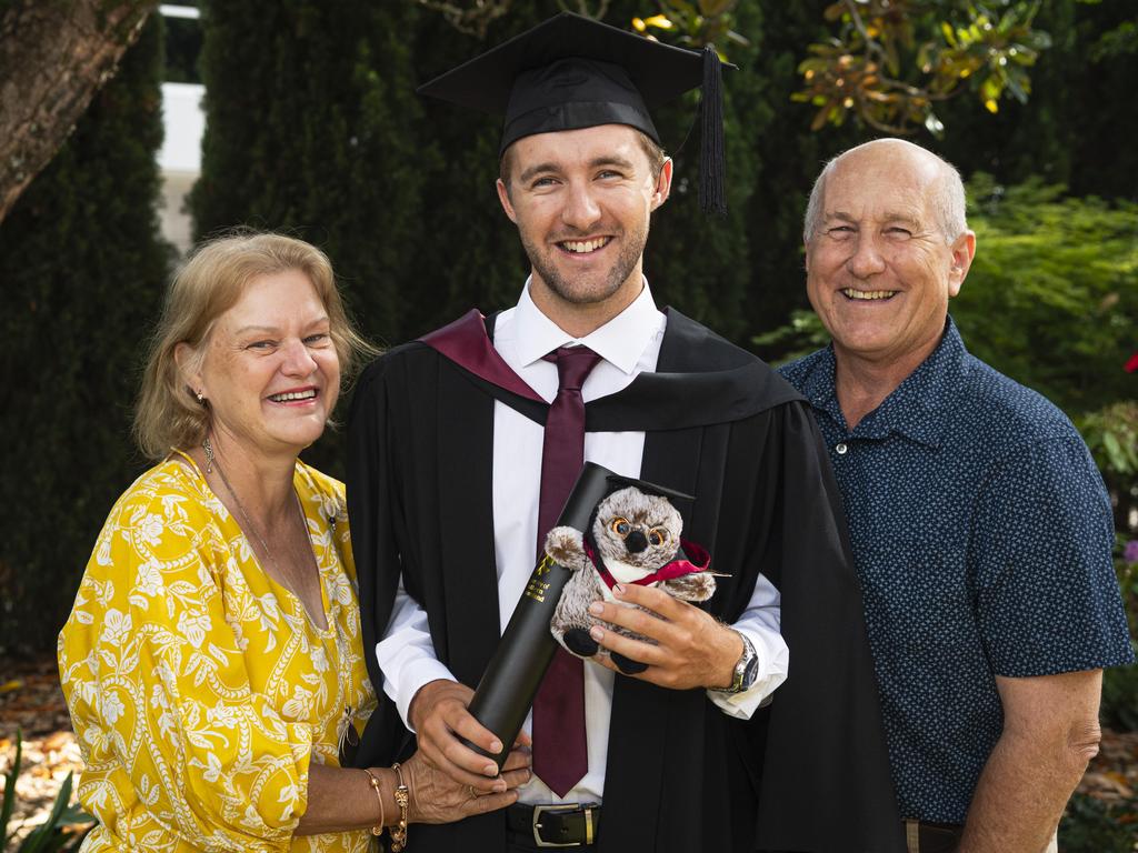 Bachelor of Surveying with First Class Honours graduate Kyran Cook awarded a University Medal is congratulated by parents Gail and Bob Cook at a UniSQ graduation ceremony at The Empire, Wednesday, October 30, 2024. Picture: Kevin Farmer