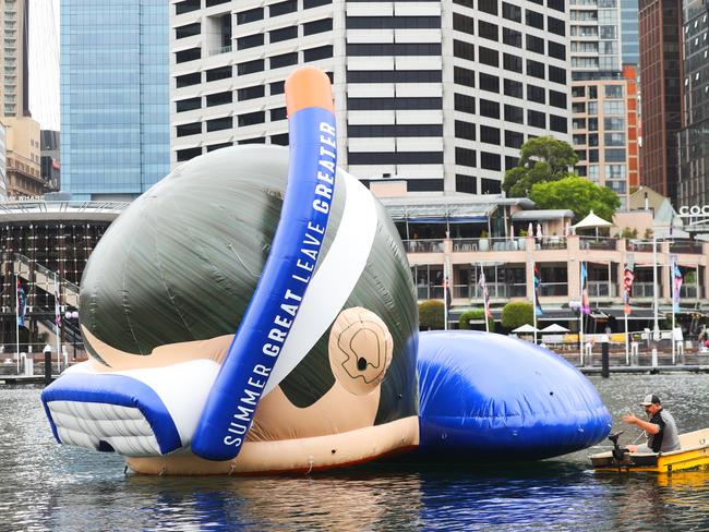 A rather large blow up snorkeler has been installed in Cockel bay in Darling harbour o promote Queensland ? .picture John Grainger