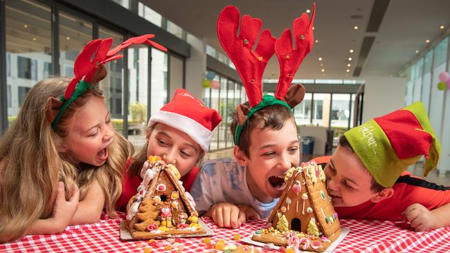 Ruby Schipper, 7, Lilly Schipper, 10, Trent Farrell, 11, and Luca D’Aloia, 11, undertake the ultimate gingerbread taste test. Picture: Brad Fleet