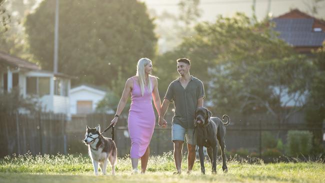 Shayna Jack and her boyfriend Joel with dogs Hugo and Willa. Picture: David Kelly