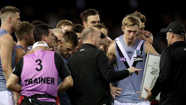 Ken Hinkley of the Power speaks with players during the Round 20 match against the Bombers at Marvel Stadium. Picture: AAP Image/Mark Dadswell