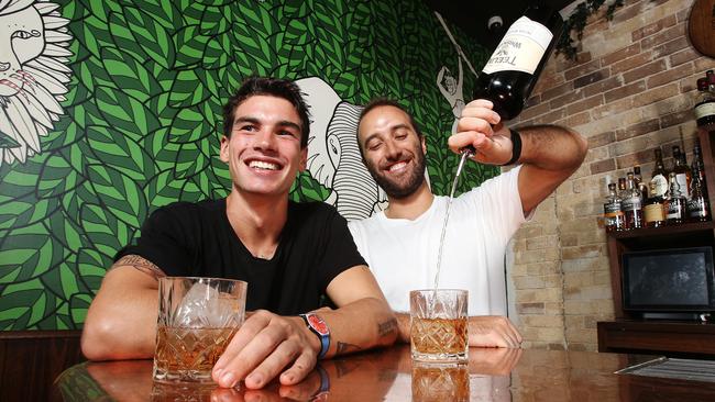 Ciarn McCool and Kim Mcdiarmid enjoy a drop at The Wild Rover, Surry Hills.