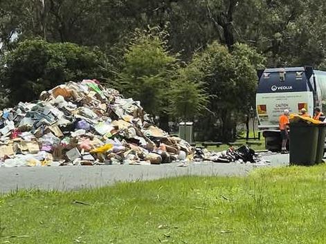 A Brisbane garbage truck collector was forced to dump the entire rubbish load on an Inala street earlier this morning. Picture: Brenden Dillon Baker