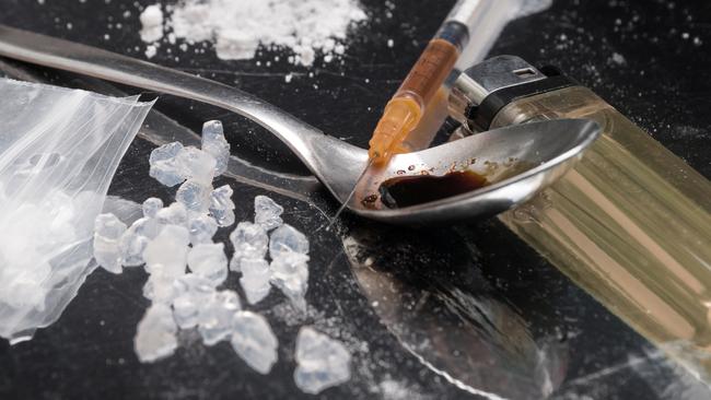 Wandering children lead police to drug needle in home