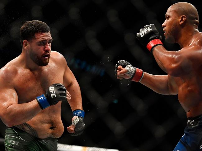 Australian fighter Tai Tuivasa (L) competes against French fighter Ciryl Gane (R). Picture: Julien De Rosa/AFP