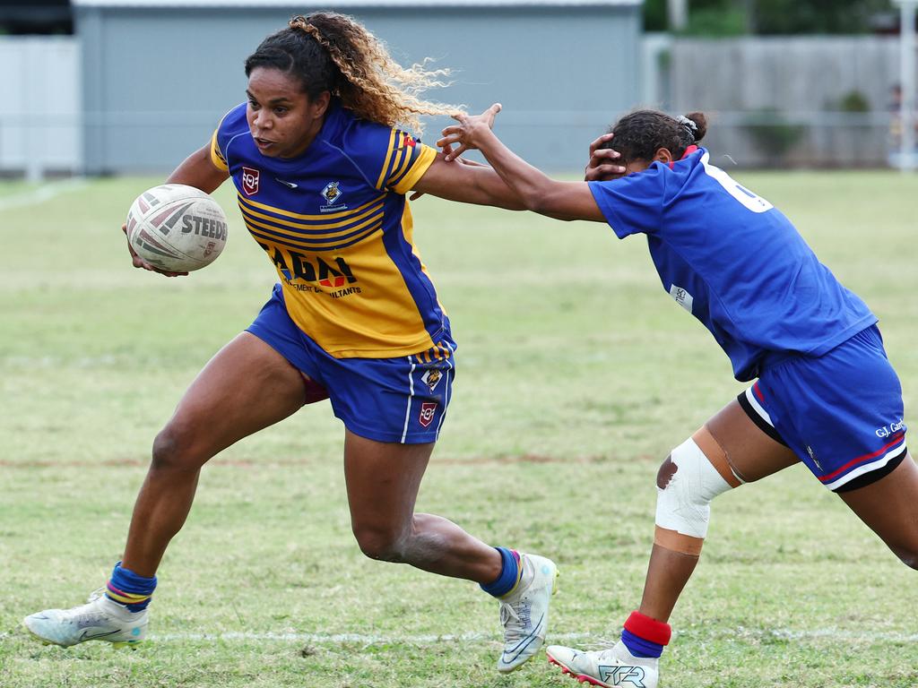 Kangaroos captain Genavie Tabuai pushes past the Maidens' defence to score a try in the Far North Queensland Rugby League (FNQRL) Women's preliminary final match between the Cairns Kangaroos and the Ivanhoe Maidens at Jones Park. Picture: Brendan Radke