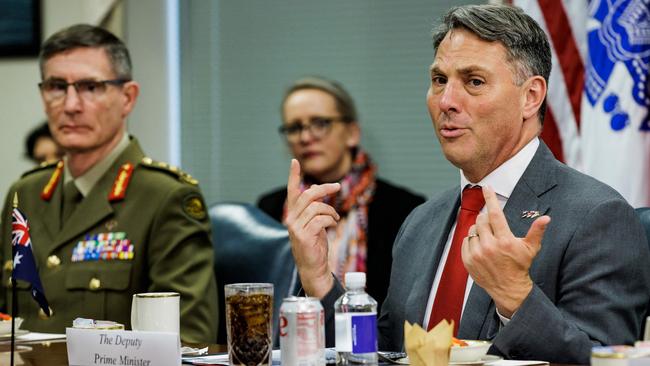 Australian Defence Minister Richard Marles speaks during a meeting with US Secretary of Defense Lloyd Austin and British Defence Secretary Ben Wallace at the Pentagon last December. Picture: AFP.