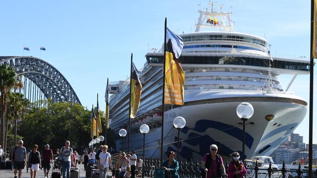 Cruise ship passengers disembark from the Princess Cruises owned Ruby Princess at Circular Quay in Sydney on March 19. Picture: AAP