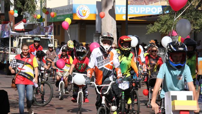 The Red Centre BMX Club Alice Springs were one of more than 30 community organisations marching. Picture: Gera Kazakov