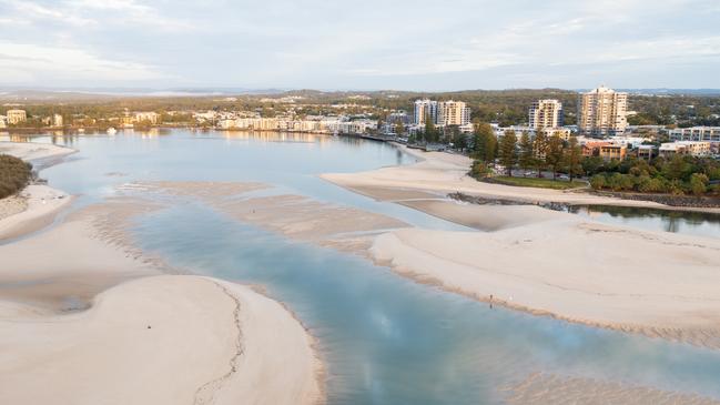 The Caloundra bar has nearly closed causing more people to swim in an area unpatrolled by surf lifesavers and lifeguards. Picture: CADE Media