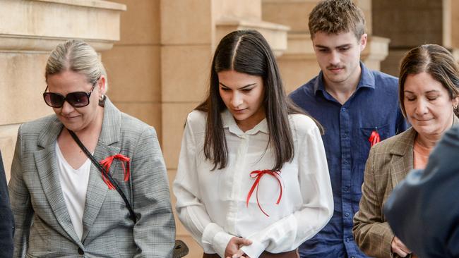 Jordyn Callea, centre, leaves the District Court after giving evidence during the trial of Alexander Campbell, accused of killing her best friend Sophia Naismith. Picture: NCA NewsWire / Brenton Edwards