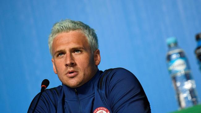 US swimmer Ryan Lochte and his new hair colour at a press conference