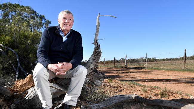 Orroroo farmer and chairman of the SA Dog Fence Board Geoff Power at an old semi repaired part of the dog fence 40km west of Ceduna. Picture: Tricia Watkinson