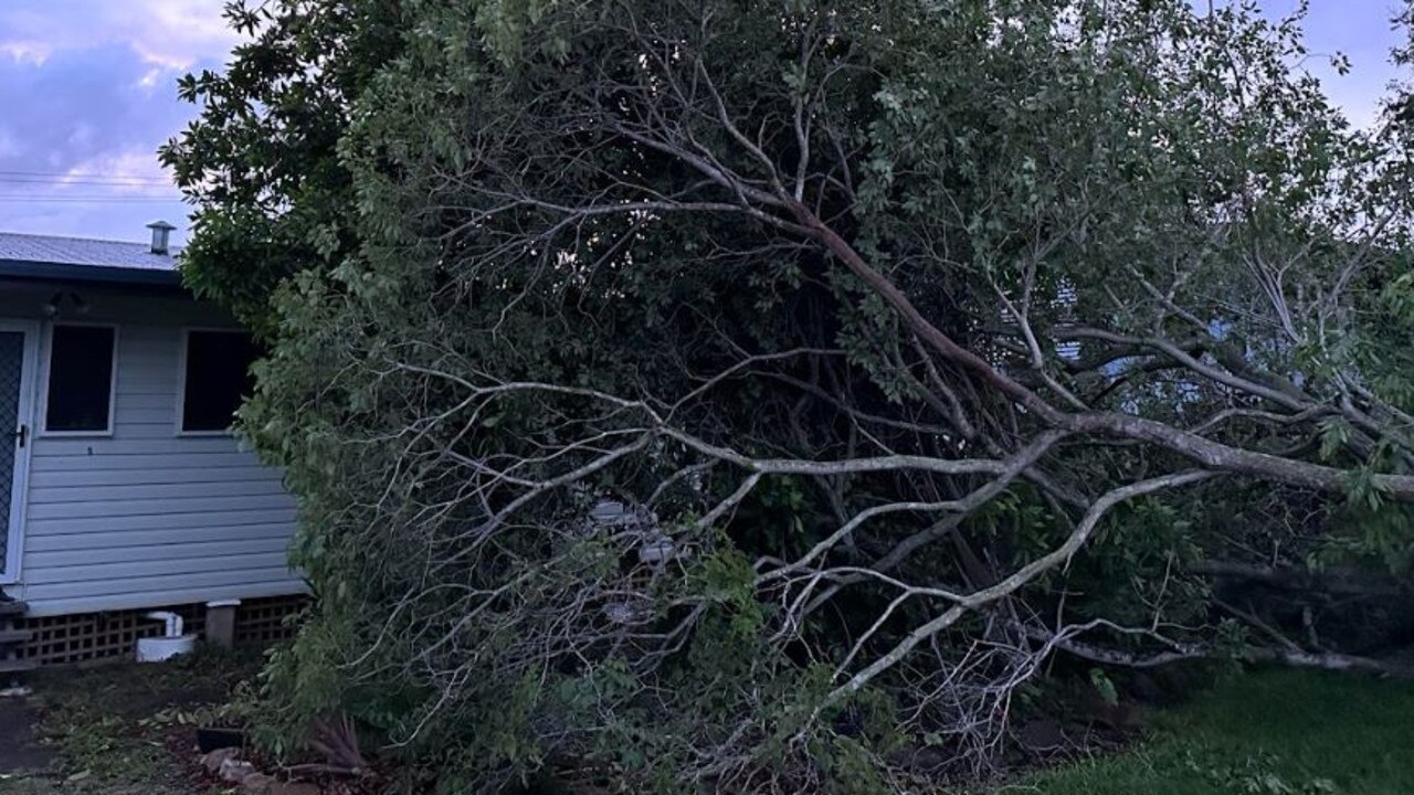 Townsville residents are waking up to assess damage caused by ex-tropical cyclone Kirrily after it crossed the coast near the city on Thursday night.