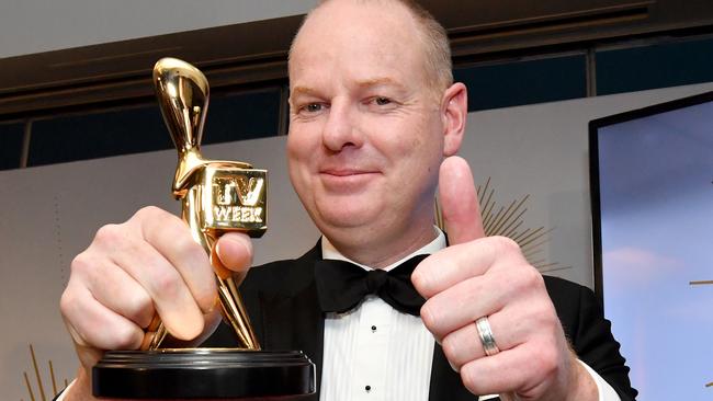 Tom Gleeson poses for a photograph after winning the Gold Logie for most popular personality on Australian TV during the 2019 Logie Awards at The Star Casino on the Gold Coast, Sunday, June 30, 2019. (AAP Image/Darren England) NO ARCHIVING, EDITORIAL USE ONLY