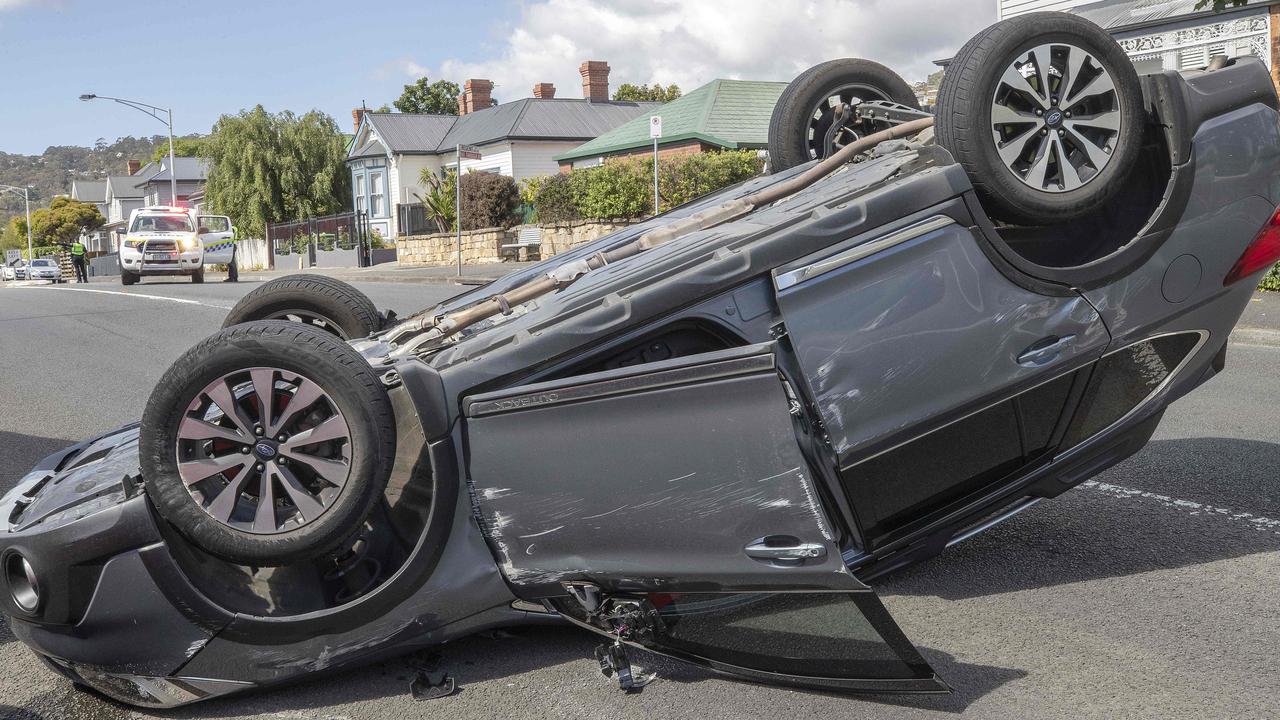 Single vehicle crash on Regent Street at Sandy Bay. Picture: Chris Kidd